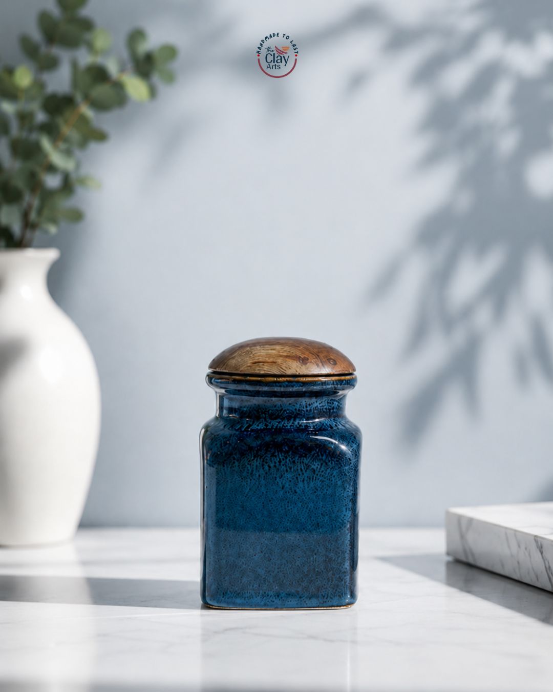 Blue Ceramic Storage Jar with Wooden Lid