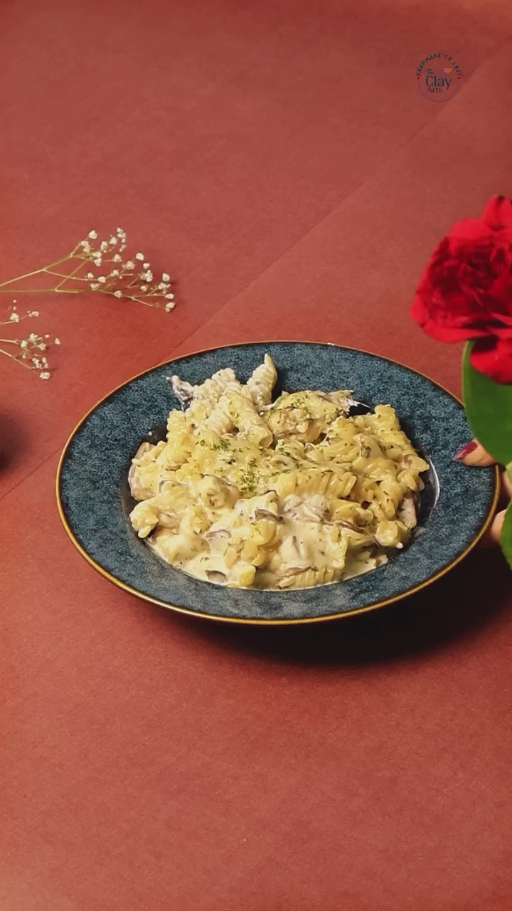 Pasta served in a Reactive Blue pasta plate